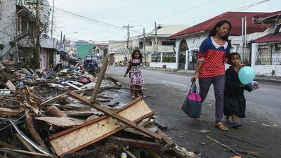 A reader says people wanting to help Philippines typhoon victims should deal with recognised charities such as the Red Crescent, which will ensure their money is directed to where it is needed. Nic Bothma / EPA