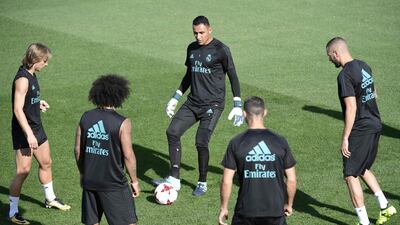 Real Madrid's Keylor Navas controls the ball while Karim Benzema and Luka Modric watch on. Javier Soriano / AFP