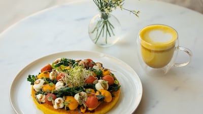 Chickpea omelette with crispy kale, tomato confit, mayo, carrot cream, balsamic glaze and roasted pumpkin seeds. Photo: Planet Terra