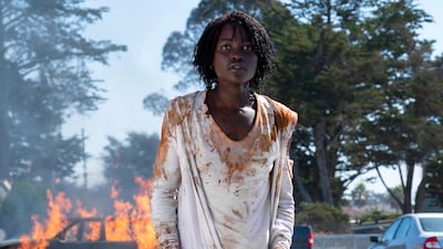 This image released by Universal Pictures shows Lupita Nyong'o in a scene from "Us," written, produced and directed by Jordan Peele. (Claudette Barius/Universal Pictures via AP)