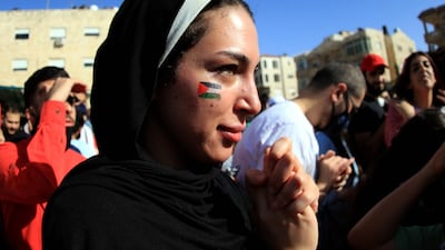 Jordanians protest in solidarity with the Palestinian people, near the Israeli embassy, in Amman. EPA