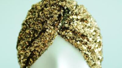 Gold glitterati turban, Dh1,500 Courtesy Nazgul Nejmi Millenry