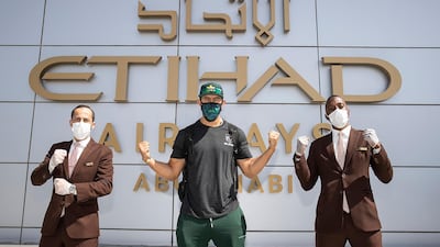UFC fighter Dominick Reyes, accompanied by Etihad staff, arrives in Abu Dhabi from Las Vegas. Courtesy Etihad