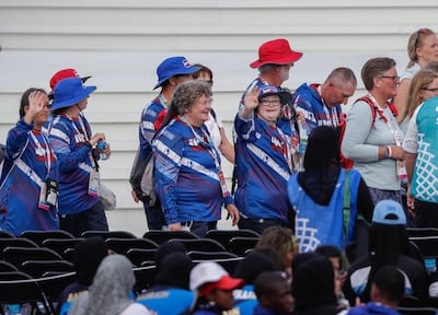 Athletes arrive for the closing ceremony. Victor Besa / The National
