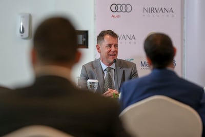 Stephen Severance, head of programme management and marketing at Masdar City, at the announcement. Khushnum Bhandari / The National