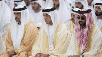 From right: Sheikh Tahnoon bin Zayed Al Nahyan, UAE National Security Advisor, Sheikh Mansour bin Zayed Al Nahyan, UAE Deputy Prime Minister and Minister of Presidential Affairs, and Sheikh Hamed bin Zayed Al Nahyan, Chairman of the Crown Prince Court of Abu Dhabi and Abu Dhabi Executive Council Member, attend Eid Al Fitr prayers at the Sheikh Zayed Grand Mosque. Ryan Carter / Crown Prince Court - Abu Dhabi