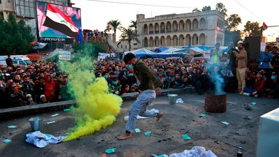 An Iraqi actor performs during a play titled "The revolution" during anti-government protests at Tahrir Square in Baghdad. AP