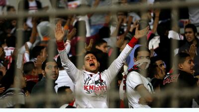 A member of Zamalek supporters club Ultras White Knights shown during an Egyptian Premier League match in February, before 20 people were killed in clashes with police outside Air Defense Stadium in Cairo where the match was being held. Ahmed Abd El-Gwad / AP Photo El Shorouk Newspaper / February 8, 2015