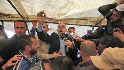 Yahya Sinwar, leader of the Islamist Hamas movement in the Gaza Strip, speaks during a protest east of Khan Younis, on April 6, 2018. AFP