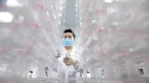 A technician carries out AI-based cervical cancer screening at a test facility in Wuhan, China. AFP