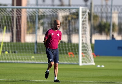 Pep Guardiola will look for Manchester City to take a step closer to winning the Premier League title at Everton. Chris Whiteoak / The National