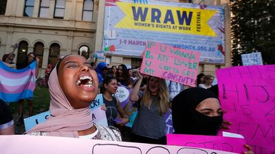 Young women gather at a rally for International Women’s Day in Melbourne, Australia. The movement for a women’s history month is gathering steam. Daniel Pockett / Getty Images