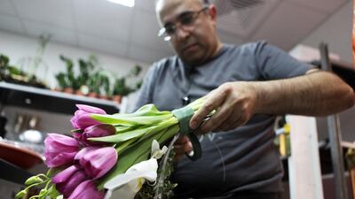 Flowers have been used for long for expression, but do we need to write on them to make them more meaningful? Galen Clarke / The National