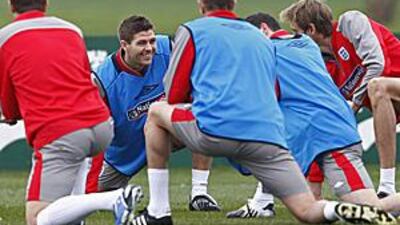 The England midfielder Steven Gerrard is all smiles during a session at Arsenal's training ground in London Colney ahead of tonight's game with the Ukraine at Wembley.