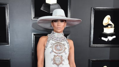 We're not sure on the hat, but Jennifer Lopez can basically wear whatever she wants: she's in Ralph & Russo Couture.