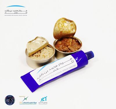 Nasa has traditionally used retort pouches and freeze dried food, whereas the Russians prefer tins and tubes. The cans can be placed on a special cooker to heat the food. Courtesy: MBR Space Centre