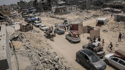 Displaced Palestinians leave southern neighbourhoods of Khan Younis after Israeli military orders to evacuate parts of the city. Bloomberg