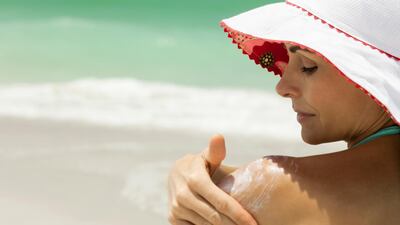 Doctors recommend reapplying SPF50 sunscreen often to protecting the skin against cancer. Getty