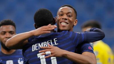 France's Ousmane Dembele is congratulated by Anthony Martial after opening the scoring. Reuters