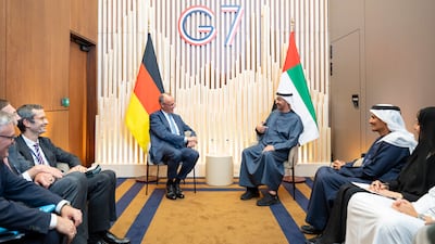 Sheikh Mohamed with Mr Merz. UAE Presidential Court