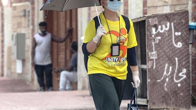 A screening centre set up to allow commuters from other emirates to travel into Abu Dhabi is fully booked for the next fortnight. Antonie Robertson / The National