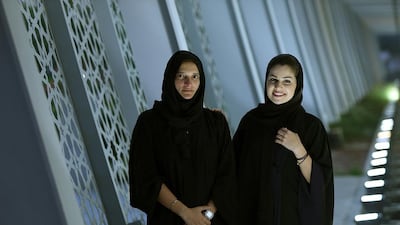 Emirati archaeologists Bakheeta Al Mansoori, left, and Myriam Al Dhaheri. Satish Kumar / The National
