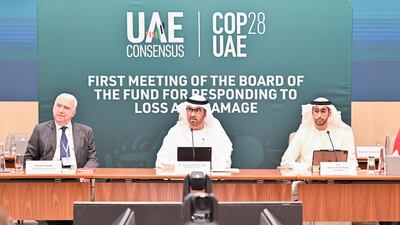 From left, Daniele Violetti, senior director for the United Nations Framework Convention on Climate Change, Dr Sultan Al Jaber, Cop28 President, and Abdulla Balalaa, the Assistant Minister of Foreign Affairs for energy and sustainability, at the loss and damage board meeting on Tuesday. Photo: Cop28