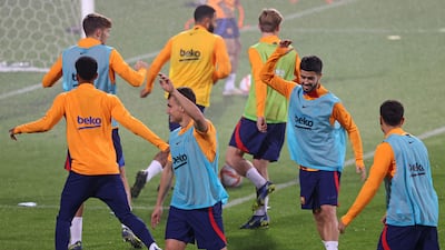 Barcelona players attend a training session at the Prince Faisal bin Fahd Stadium in the Saudi city of Riyadh on January 11, 2022. AFP
