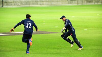 Hamza Tahir begins the celebrations after his match-winning catch for Scotland against Oman. Photo: ICC