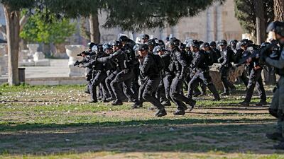Israeli security forces advance against worshippers and protesters Jerusalem's Al Aqsa Mosque compound. Witnesses said that Palestinian protesters threw stones at Israeli security forces, who fired rubber bullets at some of the demonstrators. AFP