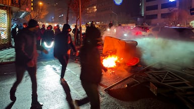Protesters rally in Tehran. Getty Images