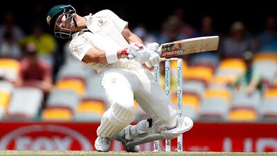 David Warner of Australia avoids a short ball from Naseem Shah in the first Test. Getty