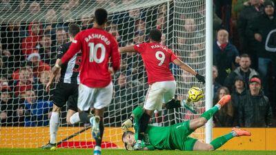 Manchester United's Anthony Martial, right, scores his team's fourth goal at Old Trafford. EPA