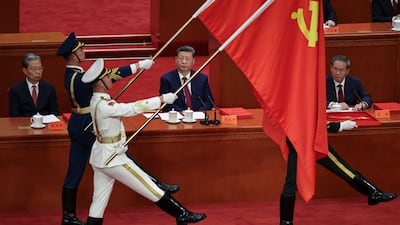 Honour guards march in front of Chinese President Xi Jinping, centre, during a celebration of the 105th anniversary of the ruling Communist Party, at the Great Hall of the People in Beijing. EPA