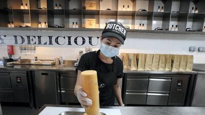 Covid-19 safety measures are implemented at The Butcher restaurant in the Marina, Dubai.