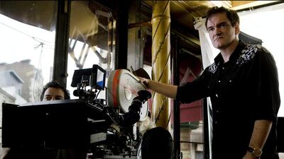 Quentin Tarantino is among the filmmakers who persuaded major Hollywood studios to stock up on film. Francois Duhamel / The Weinstein Co / AP Photo