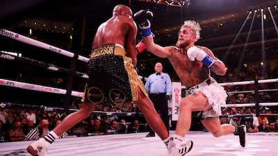 Jake Paul punches Anderson Silva during their cruiserweight bout at Gila River Arena. AFP