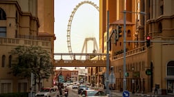 Taxis drive through Dubai’s Marina district. AFP