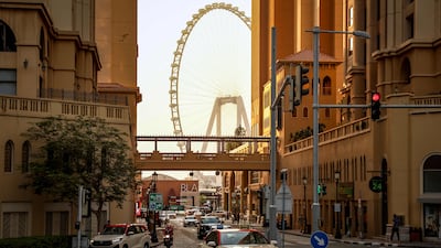Taxis drive through Dubai’s Marina district. AFP