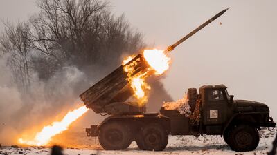 Ukrainians fire a Soviet-era Grad multiple rocket launcher at Russian positions in Kharkiv. AP