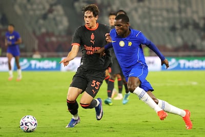 Chelsea striker Nicolas Jackson, right, in action during a pre-season game against AC Milan. Getty Images