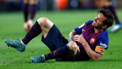 Lionel Messi suffered his injury in the first half against Sevilla on Saturday. AP Photo