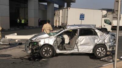 The motorist is believed to have reversed too far and broken through the barrier on the third floor of the parking complex, falling to his death. Courtesy Dubai Police