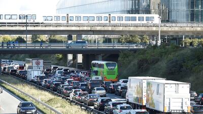 Vehicles sit in traffic after Oresund Bridge, near Copenhagen, is closed due to a police operation in Denmark (Reuters)