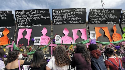 Women protest in front of fences placed outside the National Palace on International Women's Day in Mexico City, Mexico. Reuters