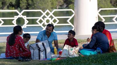 A family enjoys a meal at Dolphin Park in the Eastern Mangroves. All photos by Victor Besa / The National