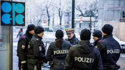 Austrian police officers stand guard outside the Opec Secretariat ahead of the group's meeting in Vienna on Thursday. Akos Stiller / Bloomberg