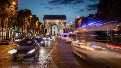 The monumental installation will wrap the landmark Parisian monument under 25,000 square metres of silver-blue fabric. Getty Images