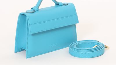 The Micro Foux bag in shade Splash by Foux. It comes with a strap and belt strap.