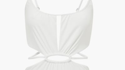 Cut-out swimsuits: the white Jonathan Simkhai Genesis cut-out swimsuit brings a plethora of details to this classic one-piece, with spaghetti straps, ruching, cut-outs and a midsection belt, all combining to make it a key piece for summer; Dh606, Jonathan Simkhai at bloomingdales.ae. Photo: Bloomingdales